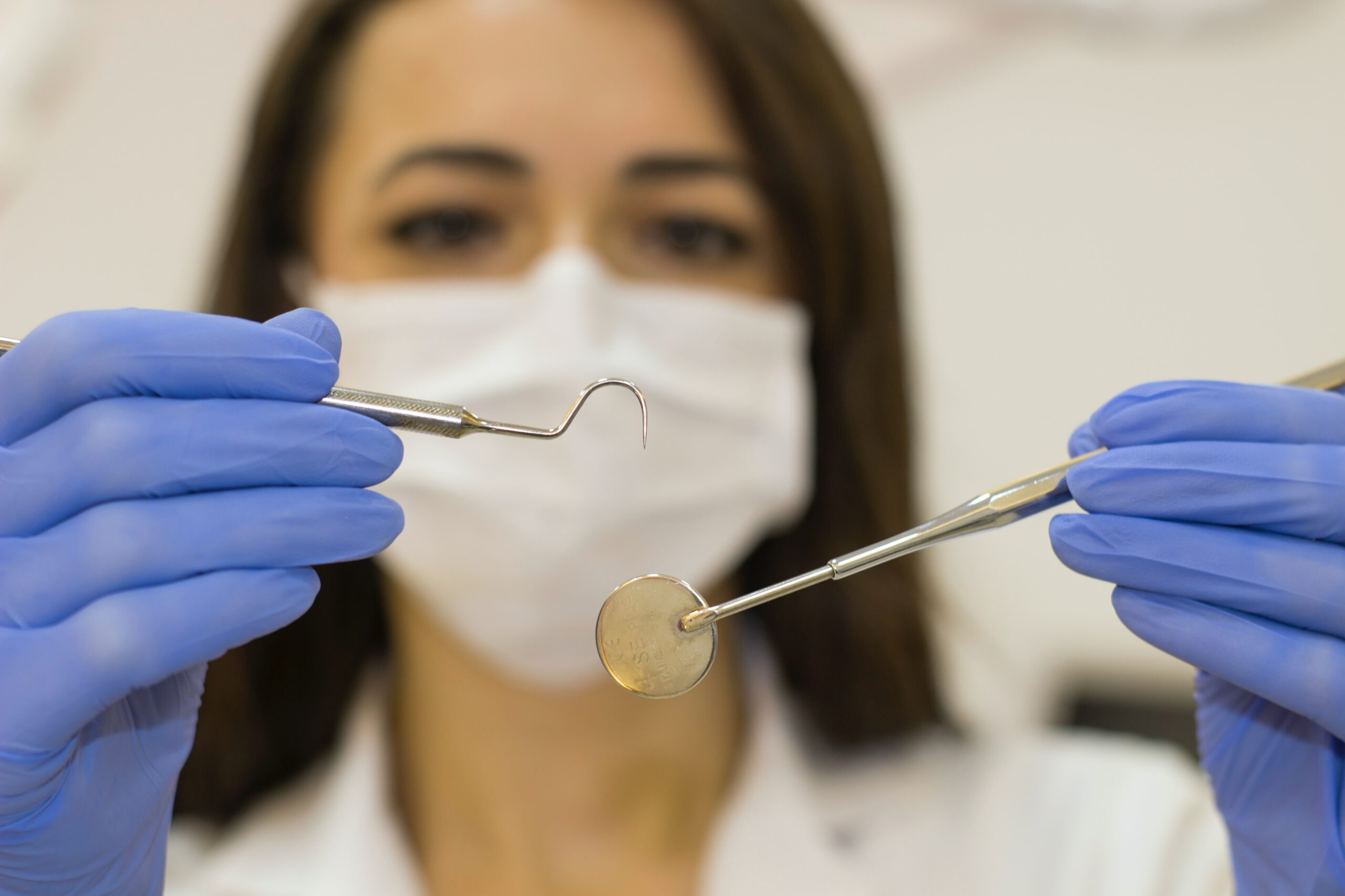 Dentist holding tools
