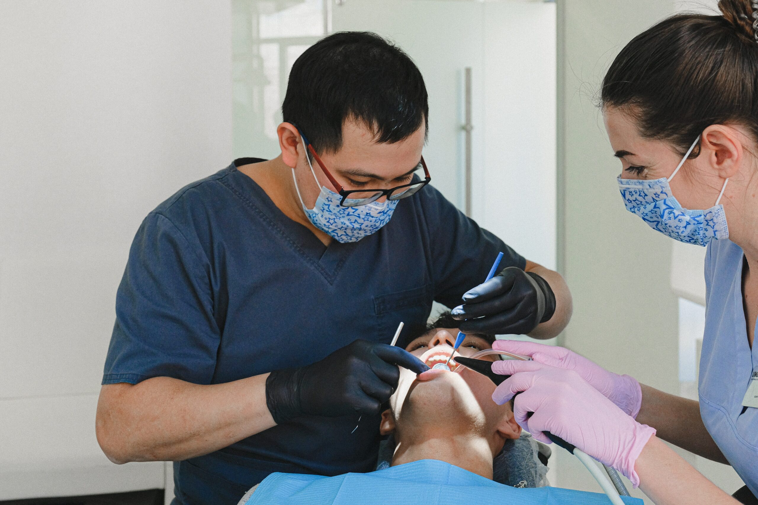 An endodontia specialist with technician